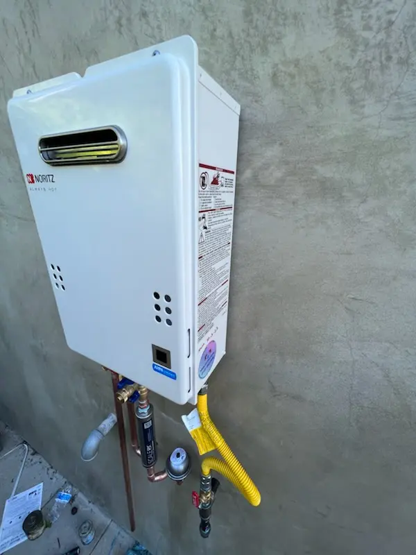 Tankless water heater installation for Alden Manor homes